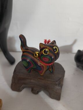 Wooden hand carved kitty cat feline figurine statue in multi-color, amber eyes